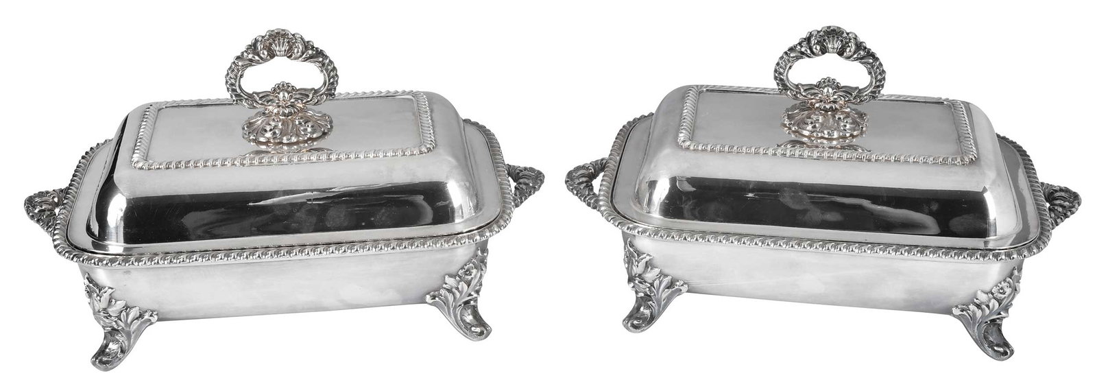 Pair Old Sheffield Plate Entrees: English, late 18th/early 19th century, rounded rectangular form with gadroon borders, with two handle and scroll feet bases, unmarked, 8 x 11-1/2 x 8-1/2 in. Provenance: Lifetime Collection of a