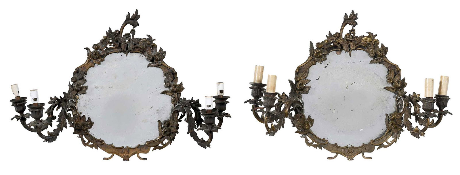 Pair of Continental Bronze Mirrored Four Light Sconces: 20th century, flower wreath border holding mirror plate and issuing four arms, 14-1/2 x 18 x 6-3/4 in., wired for electricity Provenance: Collection of Dr. James Harkrader, Richmond, Virginia