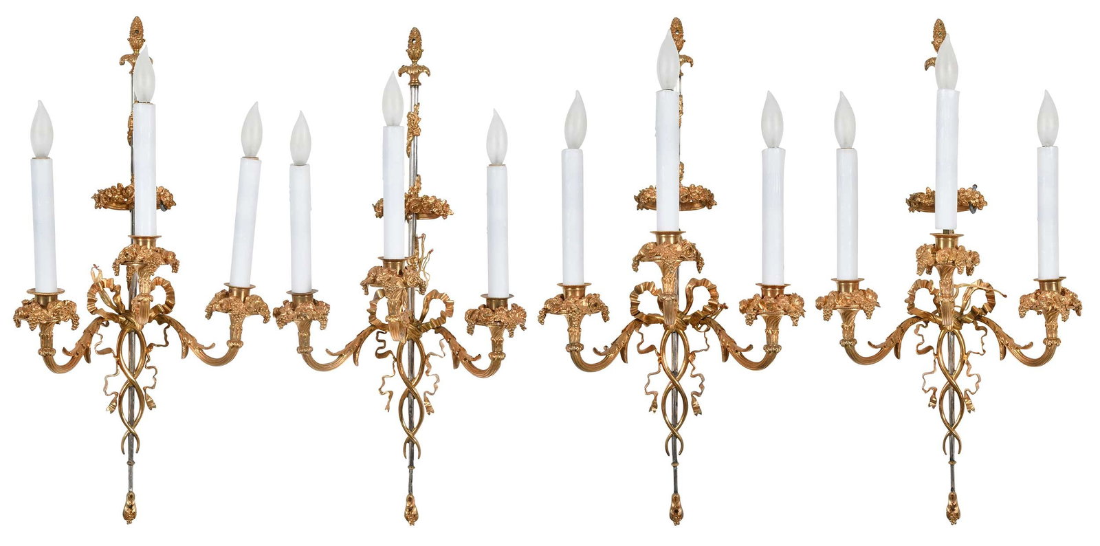 Set of Four Henri Vian Gilt-Bronze Three Light Wall Sconces: (French, 1860–1905), each stamped "H.V." verso, one signed "Vian", floral wreath and ribbon adorned central column issuing three arms, each 25 x 12 x 6-3/4 in., wired for electricity; together w