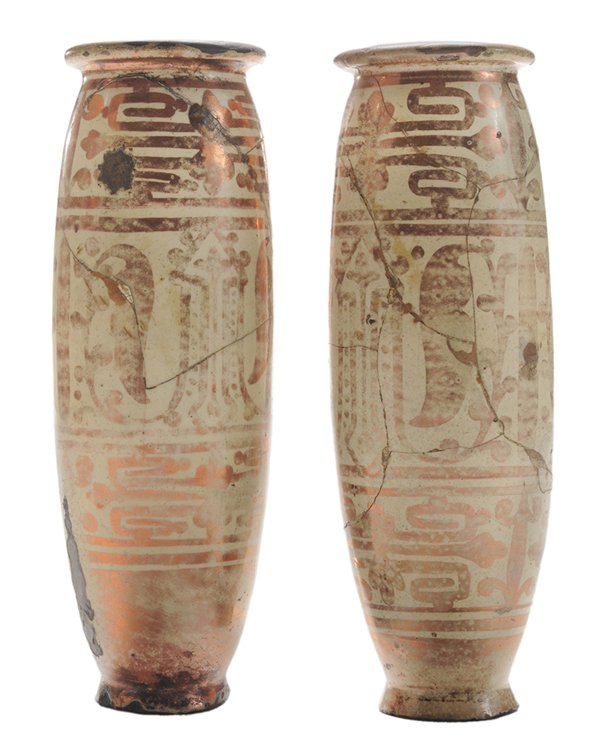 Pair Hispano-Moorish Copper Luster: [Meieros] (Honey Jars) Spanish, 17th century, each with rolled rim, the redware bodies with copper luster geometric designs, circular bases, each approximately 9-1/8 x 3-1/4 in., both extensively rest