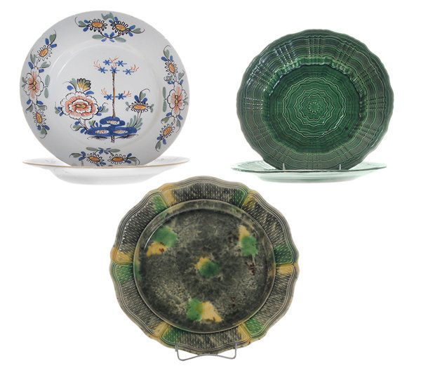 Five Early English Earthenware Plates: 18th/19th century, comprising a pair of creamware green-glazed plates, circa 1770, each with incised engine-turned design; pair English Delft plates with floral decoration, [typical glaze losses at ri