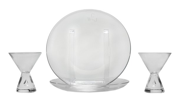 Twelve Steuben Plates, Twelve: Teardrop Martini Glasses 20th century, twelve clear plates monogrammed "C [over] W*J", 8-1/4 in. diameter; twelve clear teardrop martini glasses, no monogram, 3-3/4 in., all with original cloth bags a
