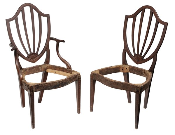 Pair American Federal Shield-Back: Chairs New England, circa 1800, comprising one arm and one side chair, cherry with maple rails, each with shield back with fan-carving, "icicle" inlaid legs, through-tenon construction, old dry surfac