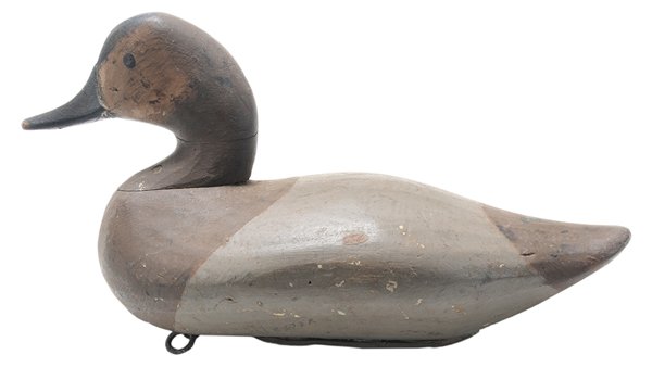Carved and Painted Wooden Decoy: American, 20th century, one-piece body with applied head, applied lead weight and ring on bottom, marked or signed in pencil "Don? Vester", 8 x 12-3/4 x 5-5/8 in., possible repainted overall. Provenan