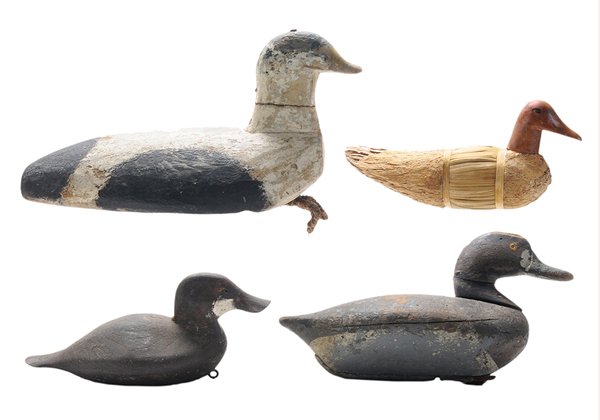 Three Carved Wooden Decoys,: Husk Body Decoy American, 20th century, carved and painted elder drake, one piece body, pegged in head, painted black, white, yellow beak, old lead weight and tie loop on base, 8 x 15-1/2 x 5-3/4 in.,