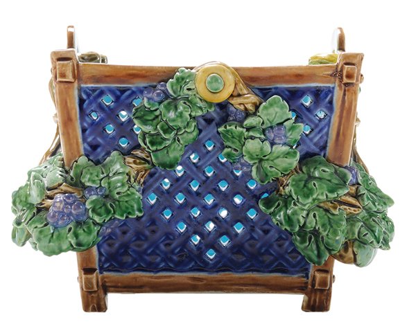 Minton Reticulated Majolica Basket: England, late 19th century, indigo ground, reticulated and footed basket-form majolica pottery draped with modeled grape vines, turquoise interior and bottom, impressed mark for Minton, 6 x 8 x 7-1/4 