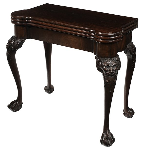 Irish Chippendale Triple-Top: Accordion-Action Games Table British, 18th century, highly figured walnut veneers, bold lion mask carved knees and ball-and-claw feet, secondary top with inlaid backgammon and chess board, baize-lined