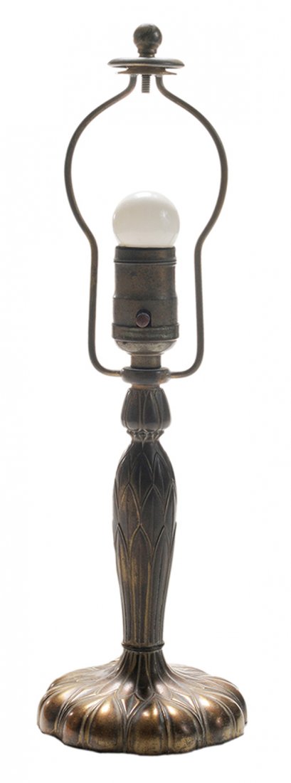 Art Deco Pairpoint Table Lamp Base: American, early 20th century, arched shade support, palm leaf form center support, petal form base, stamped "Pairpoint C3064", electrified, 14-1/2 x 4 in., good condition. Provenance: Collection of Dr