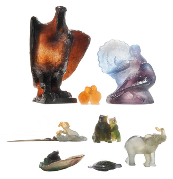 Eight Pieces Daum Nancy Cast: Glass Articles French, 20th century: large figure of a bird, cast signature "M Legendre" and "Daum" and "15/200", heavy amber cast glass, 14 in., [break and loss at beak (caution, very sharp), paint a