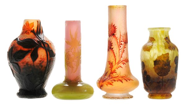 Four Cameo Art Glass Vases: French, late 19th/early 20th century, comprising a fine Daum Nancy hammered vase with rich green leaves and pale orange flowers on a frosted ground, base with etched and gilt signature "Daum Nancy" wi