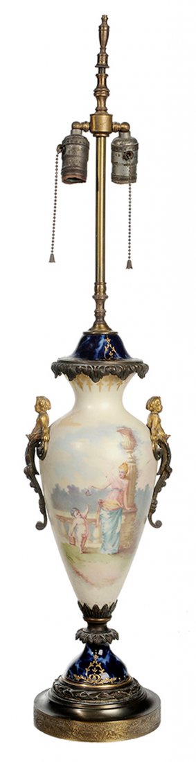 Sèvres Hand-Painted Bronze Mounted: Vase Converted to Lamp French, late 19th/early 20th century, the hand-painted porcelain vase with gilt decoration depicting a mother and [putti] in garden landscape, one side with romantic lake scene,