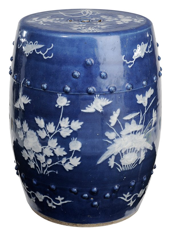 Chinese Blue and White Porcelain: Garden Seat 20th century, barrel form with white bird, floral and other motifs on dark blue ground, 18 in., generally good condition, surface wear to top, white elements with some firing cracks, some 