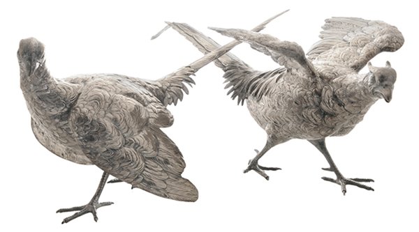 Two Sterling Figural Pheasants: German, 20th century, one with wings down, one with wings out, marks for retailer IFS (Israel Freeman & Son), .925 fine, no monograms, 78.24 oz. T., 7-3/4 X 21 X 10 in. and 8-1/4 x 17-3/4 x 6-3/4 in.,