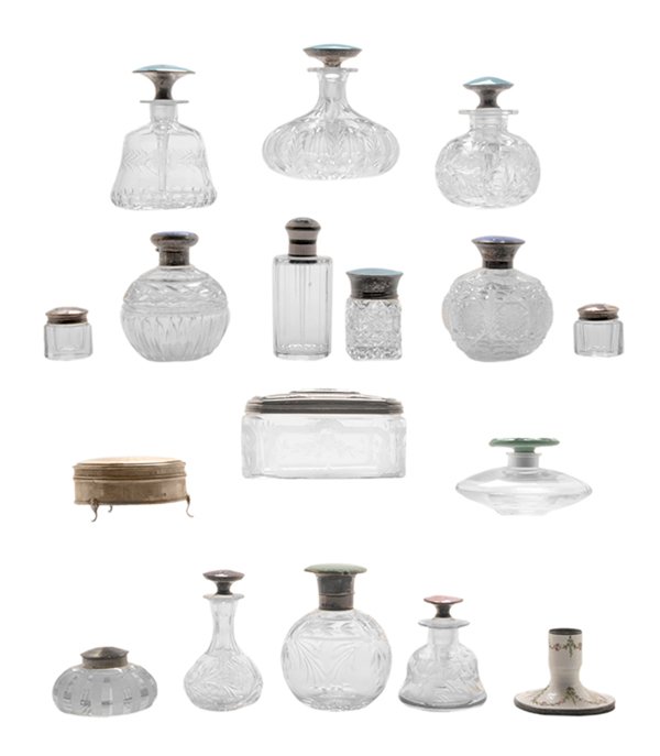 Fifteen Silver and Enamel Glass: Dresser Jars glass bases with cut or intaglio decoration, some silver lids with English hallmarks, most with enamel decoration, one with glass lid, one with gilt metal lid [damaged]; one enamel base (