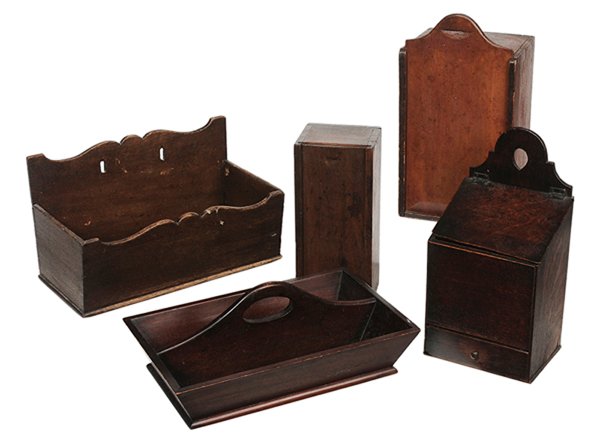 Five Assorted Antique Wooden: Kitchen Articles British and American, 18th and 19th century: comprising a sliding lid box in early salmon paint, pine throughout with nailed construction; a walnut sliding lid box; oak hanging salt b