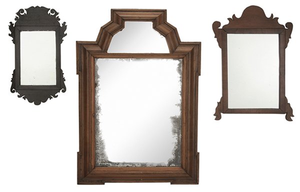 Three Antique Mirrors: Continental, British and possibly American, 18th and 19th centuries: comprising a Continental fruitwood example with mirrored crest and molded surround, [distressed mirror plate, formerly painted, min