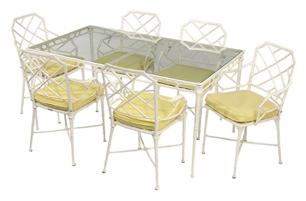 Seven-Piece Brown Jordan Cast: Aluminum Patio Dining Set 20th century, comprising a table and six armchairs, each white painted with faux bamboo turnings, chairs set with yellow cushions, tags for Brown Jordan, chairs 34-1/2 x 22 x