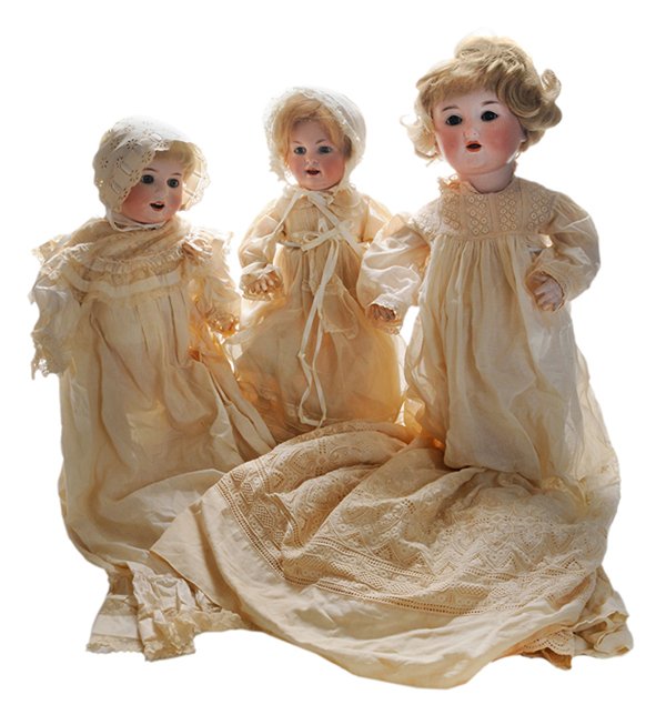 Two Armand Marseille Porcelain Head: with Heubach Porcelain Head Doll German, 20th century: one stamped "Otto Sans Germany 975 A13M", porcelain head with blond wig, inset brown sleep eyes, composition ball-jointed body, beige muslin dres