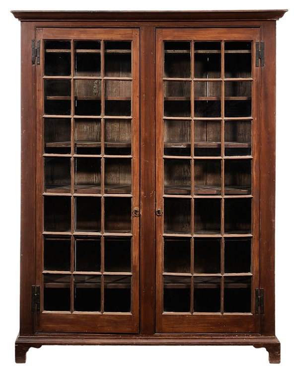 Southern Two Door Cupboard: possibly Virginia, early 19th century, yellow pine, bracket feet, hand wrought H hinges, two doors, 42 panes, six interior shelves, 85 x 65 x 15-1/2 in., feet with cracks and repairs, refinished. Prov