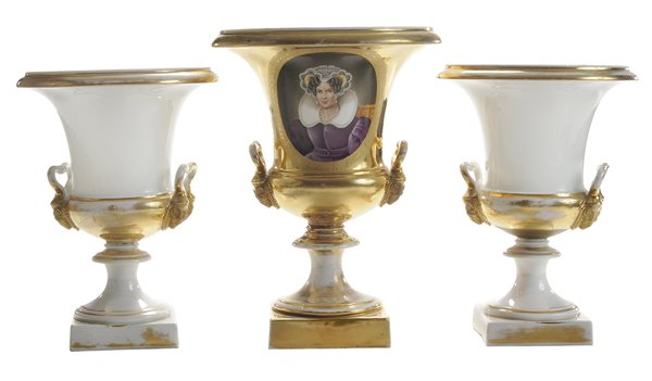 Paris Porcelain Urn, Pair of Porcelain: Urns French, 19th century: Paris porcelain urn with oval portrait of a seated woman marked "S.M. La Rein de Hollande", ram's head handles, gilt pedestal foot, square platform base, 11 in., [old break