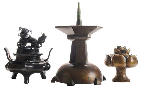 Two Bronze Figural Incense Burners,: Large Bronze Candlestick Chinese, late 19th century: removable foo dog finial, petal-form body with two handles, three flaring feet, 7-1/4 in., [minor surface abrasions;] one lotus form with removable