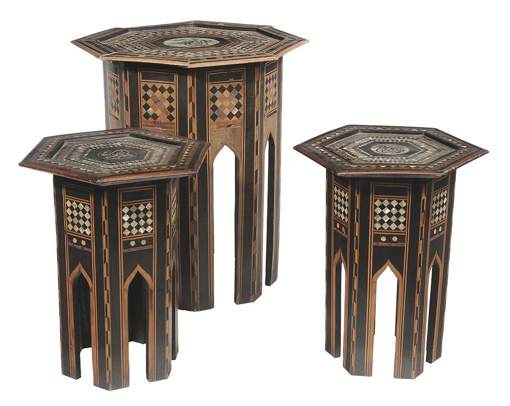 Three Moorish Style Inlaid Pedestal: Tables North African or Middle Eastern, 20th century: pair small examples, each with six-sided top with marquetry, ebonized and mother-of-pearl inlays centering a stylized Arabic emblem, 19-1/2 x 17 i