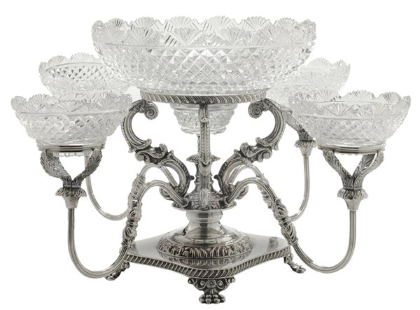Sheffield Four-Arm Epergne: English, 20th century, central support with floral mount and four scrolling arms with cut glass bowls with fan rims over diamond centers, circular base with animal paw feet, cut center bowl with confo