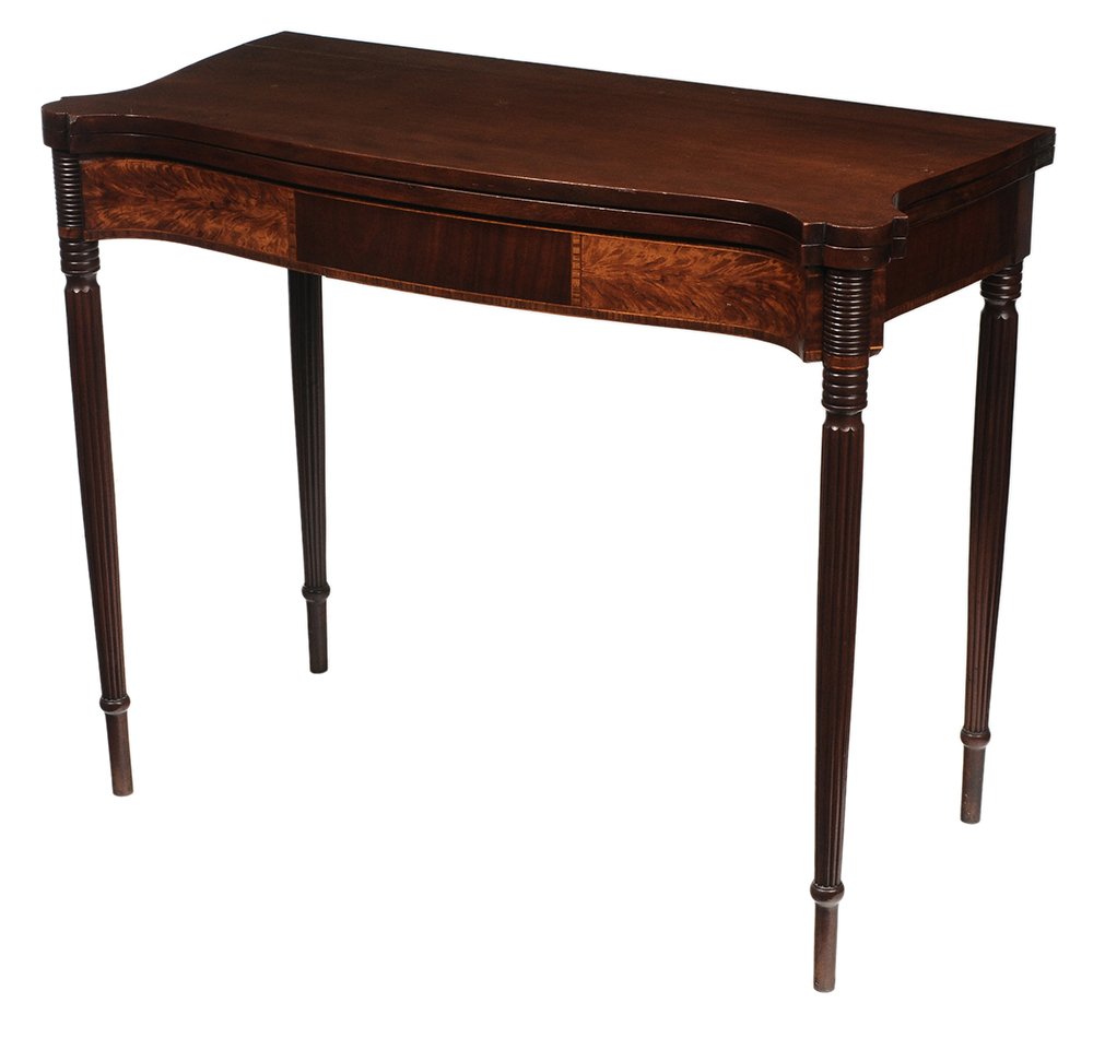 New England Federal Cherry and: Flame Birch Inset Fold-Over Card Table attributed to Salem, Massachusetts, cherry top over flame birch and mahogany-veneered serpentine skirt, turned and reeded legs, 29-3/4 x 36-1/2 x 18 in., opens t