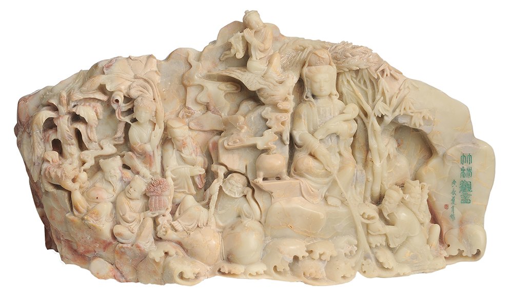 Large Figurally Carved Soapstone: Boulder Chinese, 20th century, depicting numerous figures and auspicious symbols with waves at foreground, incised and colored inscriptions, traces of gilding, 10-1/2 x 19-1/4 in. length, scattered na