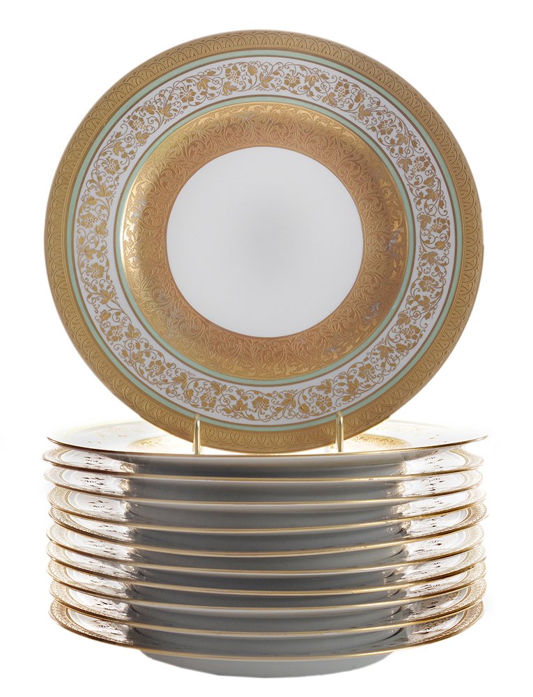 Eleven Hutschenreuther Porcelain: Service Plates German, 20th century, each with white center, green, ivory and gilt floral rims, marked "Hutschenreuther Selb Bavaria", 10-5/8 in., minor gilt losses, one with rim chip. Provenance: Col