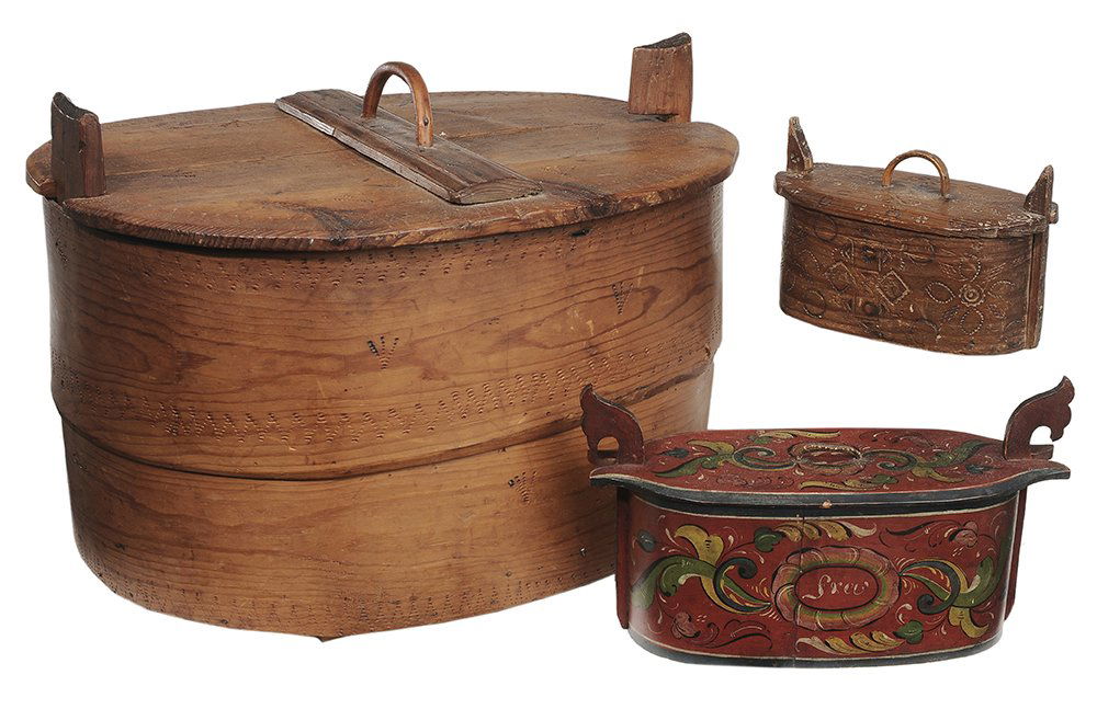 Three Antique Scandinavian Lidded: Boxes 19th century: comprising a large unpainted example with locking lid and impressed decoration, [some later nails to brace at lid, later added braces at underside of base;] together with a similar