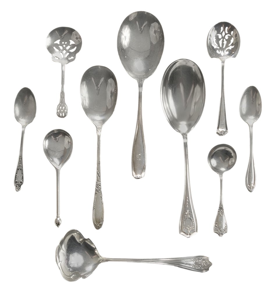 Forty-Two Pieces Sterling Flatware: American, 20th century, including nine Newburyport Silver Fleur de Lis teaspoons, [wear]; three Oneida Virginian serving spoons; Baker Manchester Roger Williams tomato server; two Lunt Chippendale bon