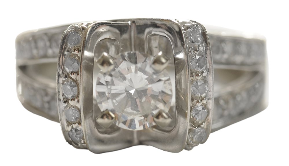 Two-Tone Gold and Diamond Ring: center 0.70 ct. round brilliant diamond secured in six-prong "Tiffany" style crown, color G-I, clarity SI-2, accented with approximately 78 round brilliant diamonds, estimated combined weight 0.70 cts