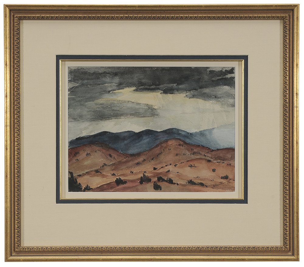 Will Shuster: (New Mexico, 1893-1969) Mountains and Desert, 1922, signed lower right "Shuster/22" and inscribed verso "NPGG-26", watercolor on paper, 8-7/8 x 10-3/4 in.; modern giltwood frame hinged in at top and t
