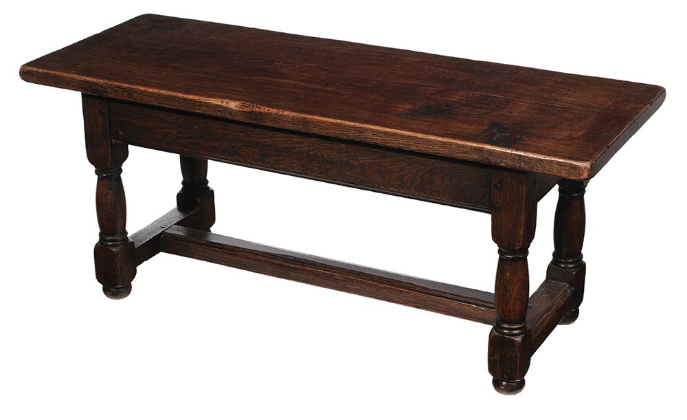 Provincial Style Baroque Oak Low: Table British, 20th century, bench or low table, oak throughout, pinned construction, block-and-turned legs, 19-1/2 x 46 x 17-1/2 in., good condition, top with some infill and minor surface stains, ot
