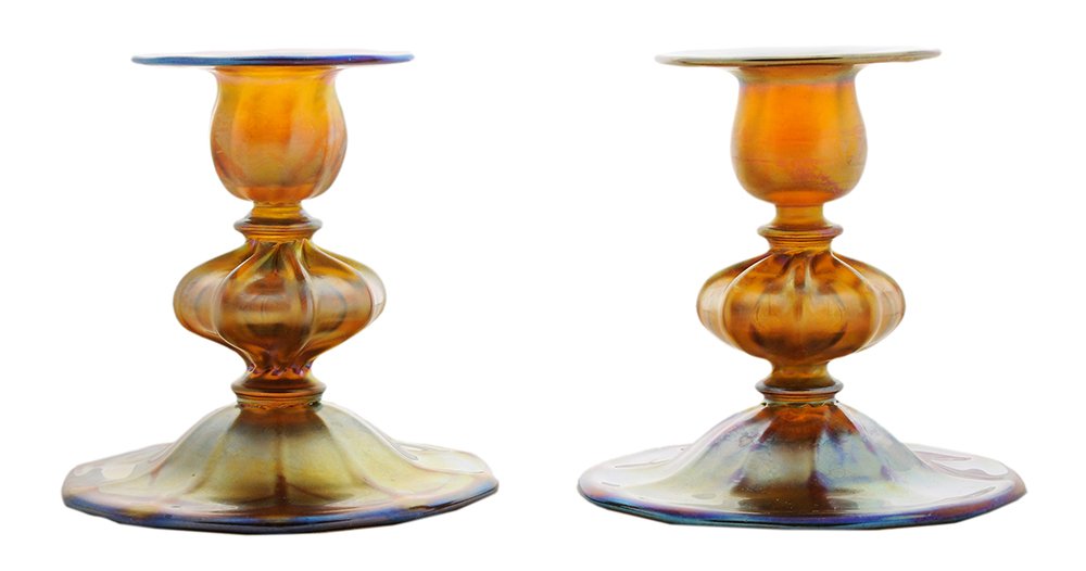 Pair Tiffany Studios Gold Favrile: Candlesticks American, early 20th century, iridescent gold pedestal form, each central post with gourd-form center, marked "LCT Favrile 1817", 4-1/2 x 4-1/4 in., good condition, scuffs and light scrat