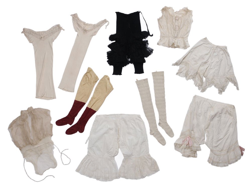 Group of Women's Undergarments: late 19th/early 20th century: silk and lace "can-can" panties; cotton chemise and matching under bottom; two cotton under vests; pair of cotton culottes and bloomers; two pairs of stockings, one pair 