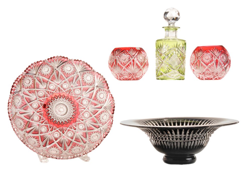 Five Pieces Brilliant Period Colored: Cut Glass late 19th/early 20th century, comprising a fine circular tray, cranberry to clear, 11 in. diameter; green-to-clear decanter with faceted stopper, 8 in.; pair globular-form cranberry-to-clear