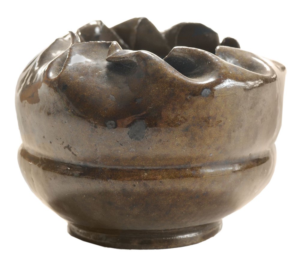 George Ohr: (George Edgar Ohr, 1857-1918) redware with mottled brown glaze, twisted and crimped top, base stamped "GE Ohr Biloxi" (Mississippi, 1890-1910), 2-3/4 in.,