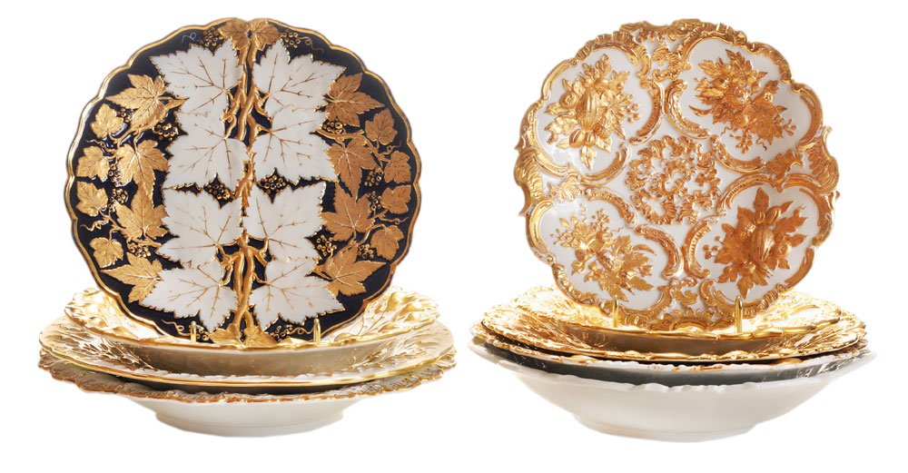 Nine Meissen Porcelain Cabinet: Plates and Shallow Bowls German, late 19th/early 20th century, all with hand-painted floral and fruit decoration, gilt highlights, crossed swords mark in underglaze blue, 9 in. to 11-1/4 in.,