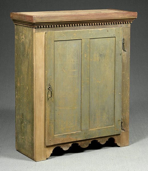 One door cupboard,: molded and painted cornice with dentil molding, double frame and panel lift-out door with mortise and tenon construction, door hunt on rat tail hinges, dovetailed top, hand-planed vertical backboards