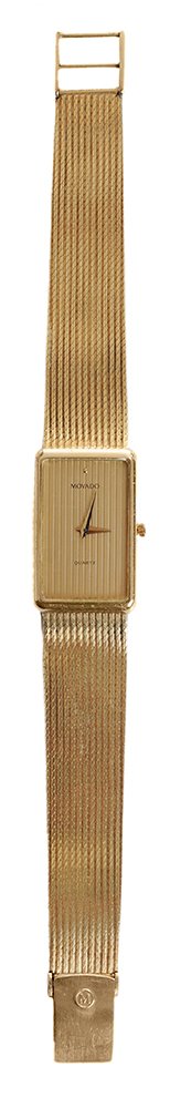 Man's 14 Kt. Movado Wrist Watch: rectangular tuxedo gold ribbed dial marked "Movado Quartz", case marked "14K Gold, B42, 7833633 18660", ribbed woven bracelet with fold over clasp, 8 in. x 14 mm. to 21 mm. scratched i