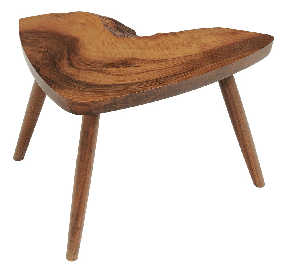 George Nakashima Free-Edge: Walnut Tripod Footstool signed "George Nakashima Nov. 1973", undersigned also signed with client's name, figured single-board top, three turned legs, 12-1/2 x 19 x 14 in., excellent condition,
