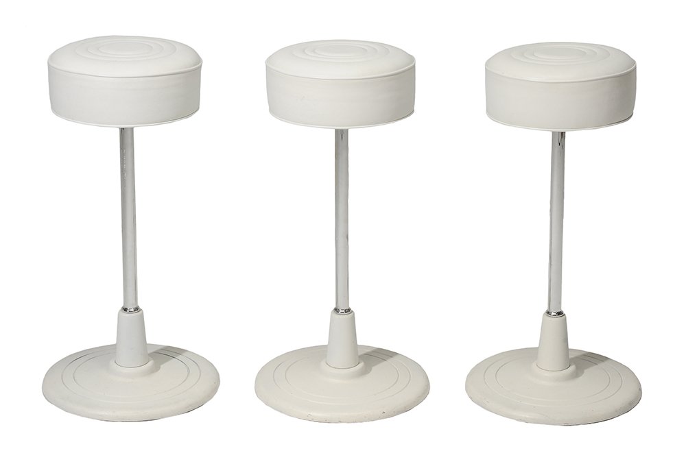 Three Eileen Gray Bar Stool No. 1: American, designed by Eileen Gray in 1927, manufactured by Classicon, each numbered "412846", authorized by the world license holder Aram Designs Ltd., London, each with a circular palmaline c