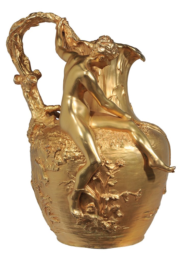 Claude Vibert "Female Pechant": Gilt Bronze Art Nouveau Urn French, late 19th century, shaped rim and spout with applied leaf-and-branch twisted handles, seated female nude on shoulder, pond scene with flowers, lily pads, birds, ins