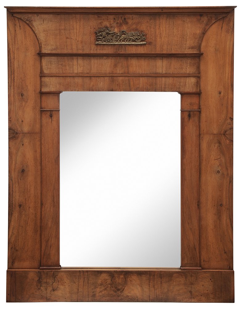 Empire Walnut Architectural Trumeau: French, circa 1820, straight molded cornice and inset cast bronze device depicting Roman chariot pulled by lions over rectangular mirrored plate and flanked by molded side columns, rectangular molded 