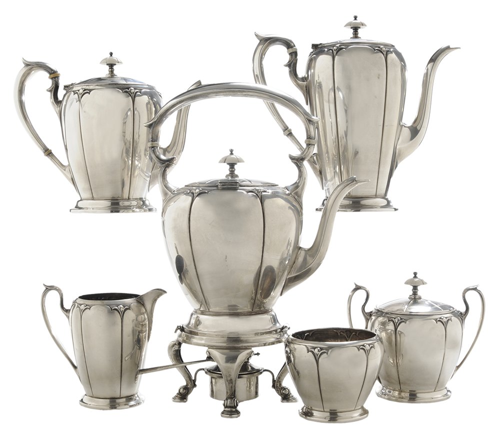 Six-Piece Wilcox Lotus Sterling Tea: Service American, mid-20th century, lotus leaf decoration, composite finial and spacers, Wilcox, no monogram, 132.08 oz. T., 14 in. hot water kettle with matching coffee pot, teapot, creamer, covered 