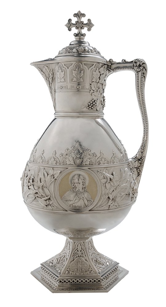 Fine Gothic Revival Elaborate Sterling: and Diamond-Inset Ewer American, 1897 date mark, urn form, central band with lilies, wheat and medallions with the Mother of God, Christ and symbol of Holy Church with collet set closed back old mine-