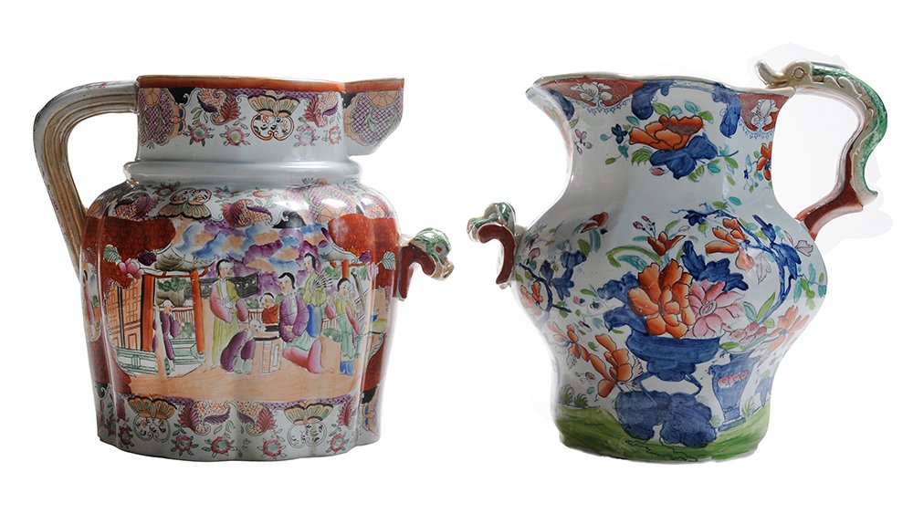 Two Mason's Ironstone Footbath: Jugs English, circa 1820, both with Mason's marks, one red scale "Sacrificial Lamb" pattern, 1813-1820, Chinese family on each side, applied dragon-head handle below spout, 12 in., specks of g