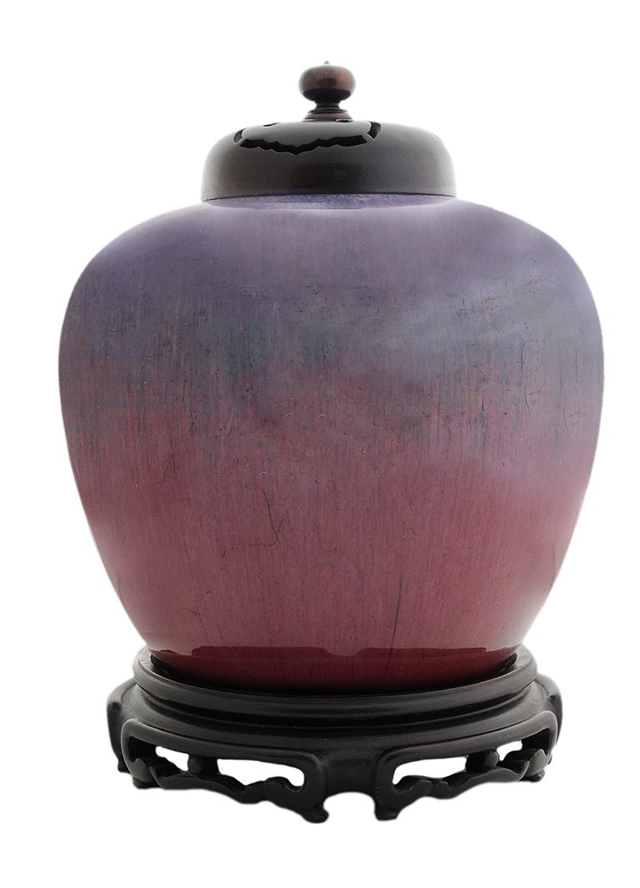 Ox Blood Flambé Glazed to Turquoise: Covered Jar on Stand Chinese, 19th century, finely carved hardwood pierced wooden cover, ginger jar form body with flambé glaze to ox blood, base marked "MPM=" in old printing, 10-1/4 in.